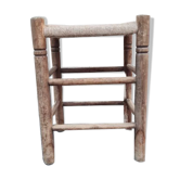Vintage handmade wooden stool and rope