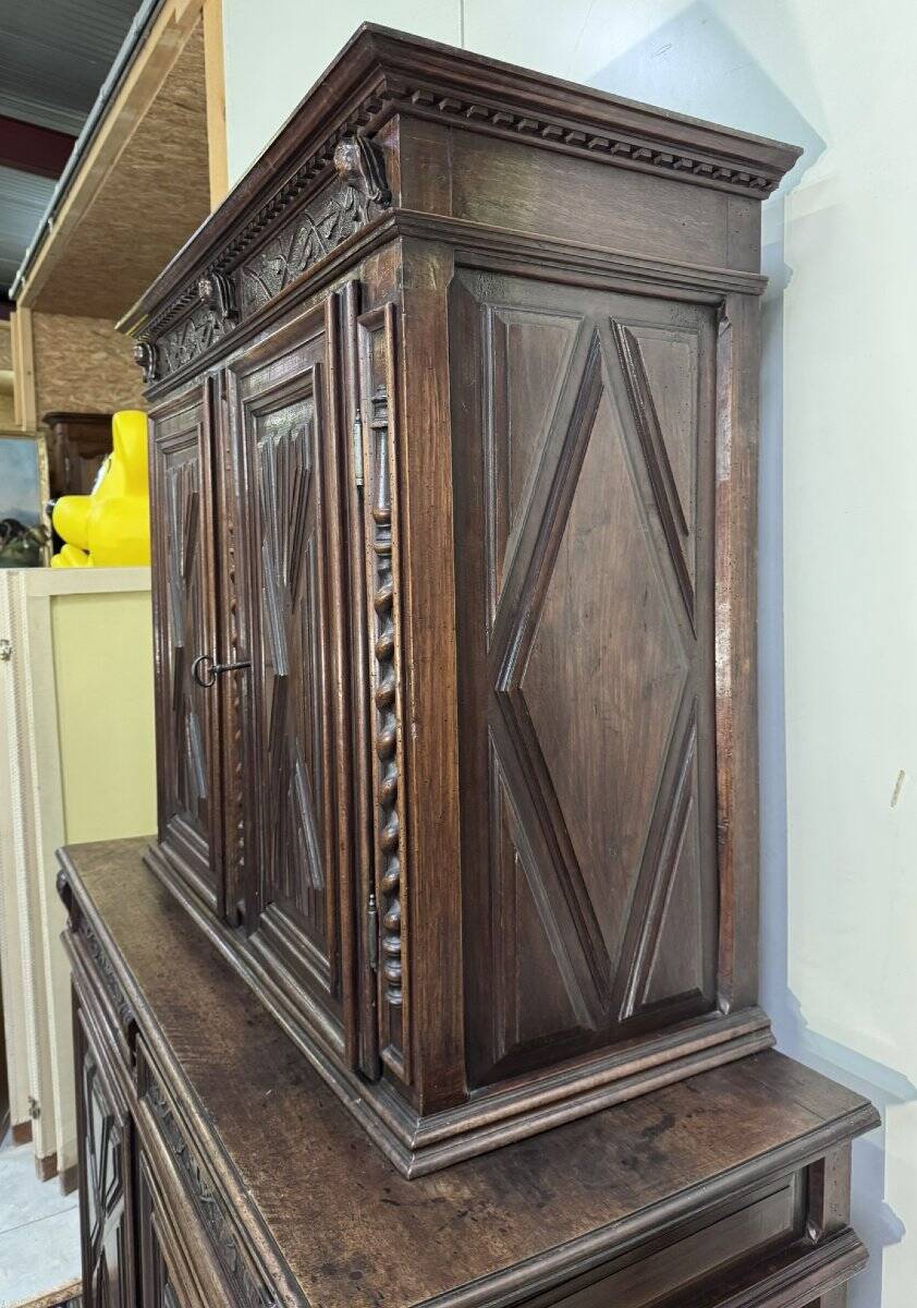 Four-panel buffet from the Louis XIII period in solid walnut.