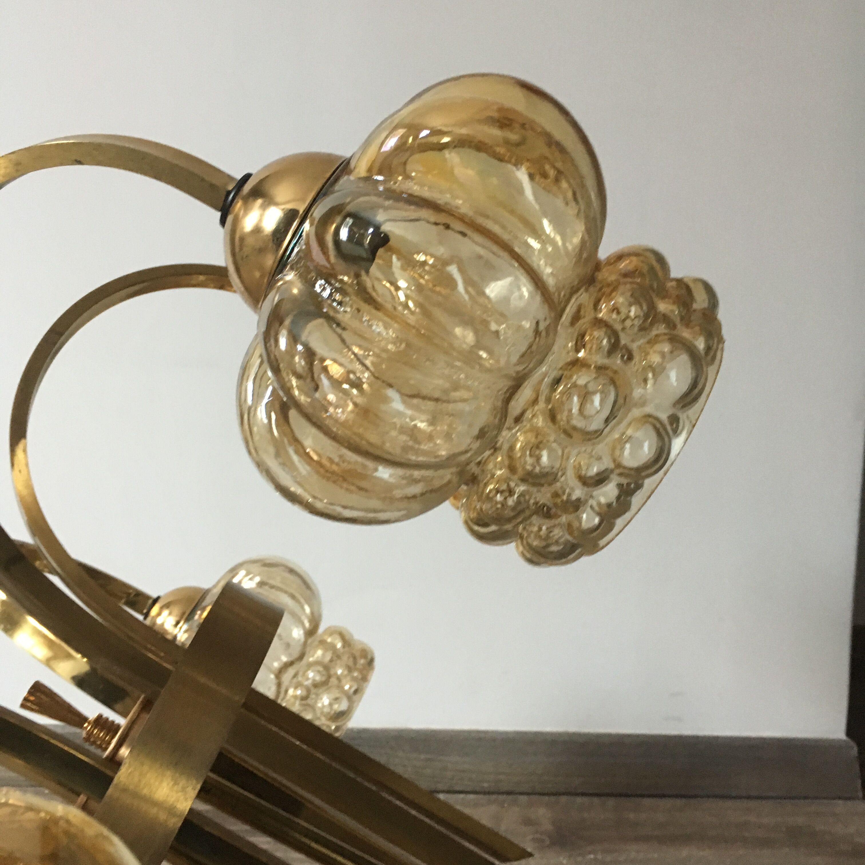 Brass-style chandelier and puffed glass 60/70