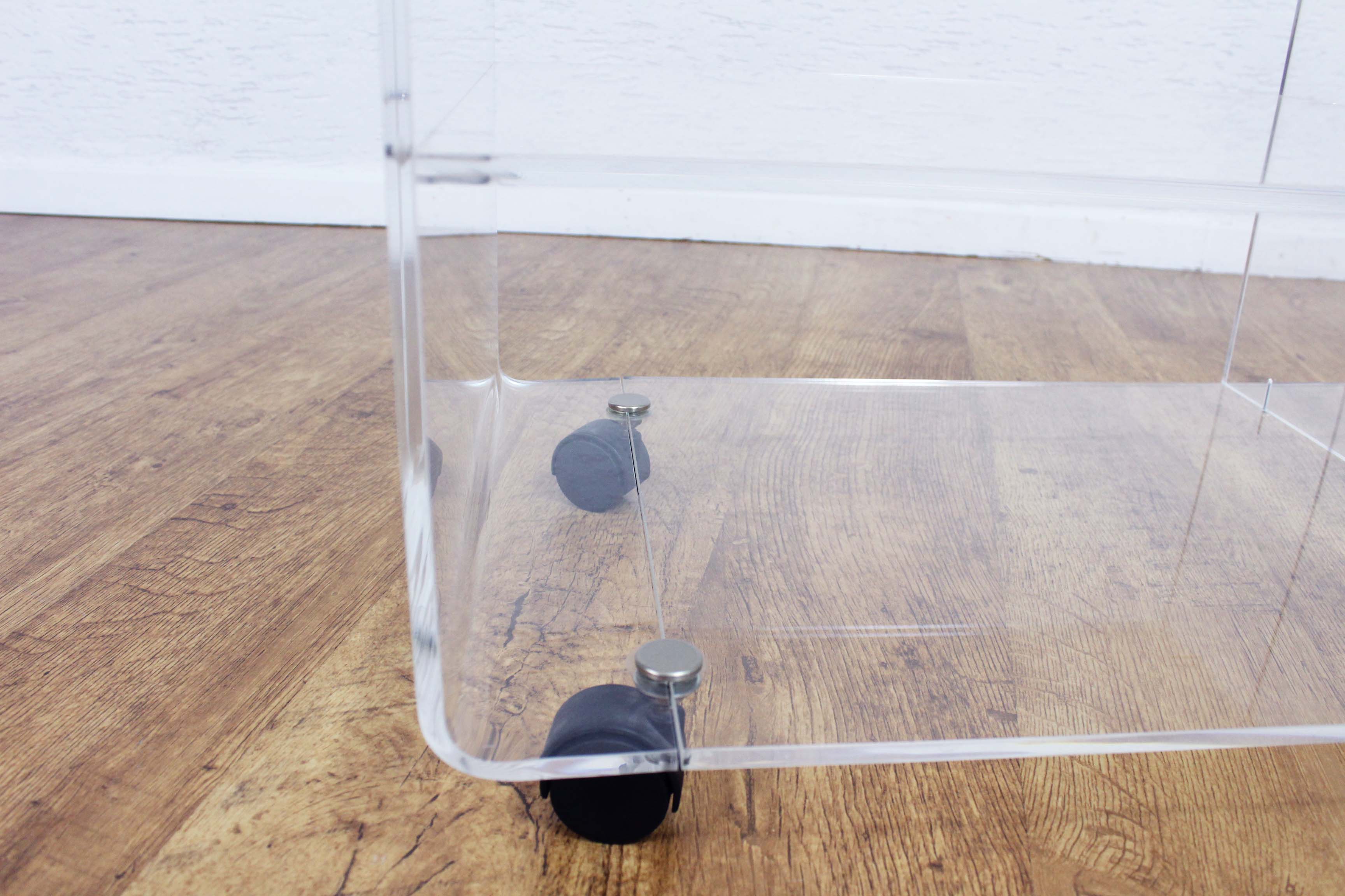 Plexiglas coffee table with vinyl compartment and magazines rack