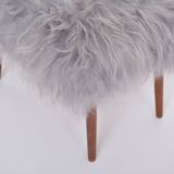 Danish Mid-century Modern stool reupholstered in grey sheep skin