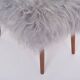 Danish Mid-century Modern stool reupholstered in grey sheep skin