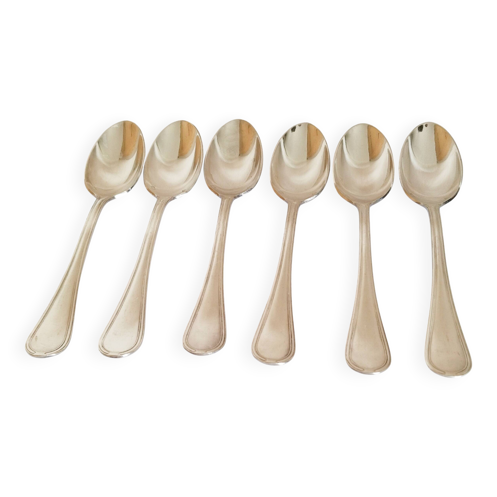 Dessert spoons, silver teaspoons
