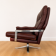 Vintage Swedish Arne Norell lounge chairs and matching stools 1970s