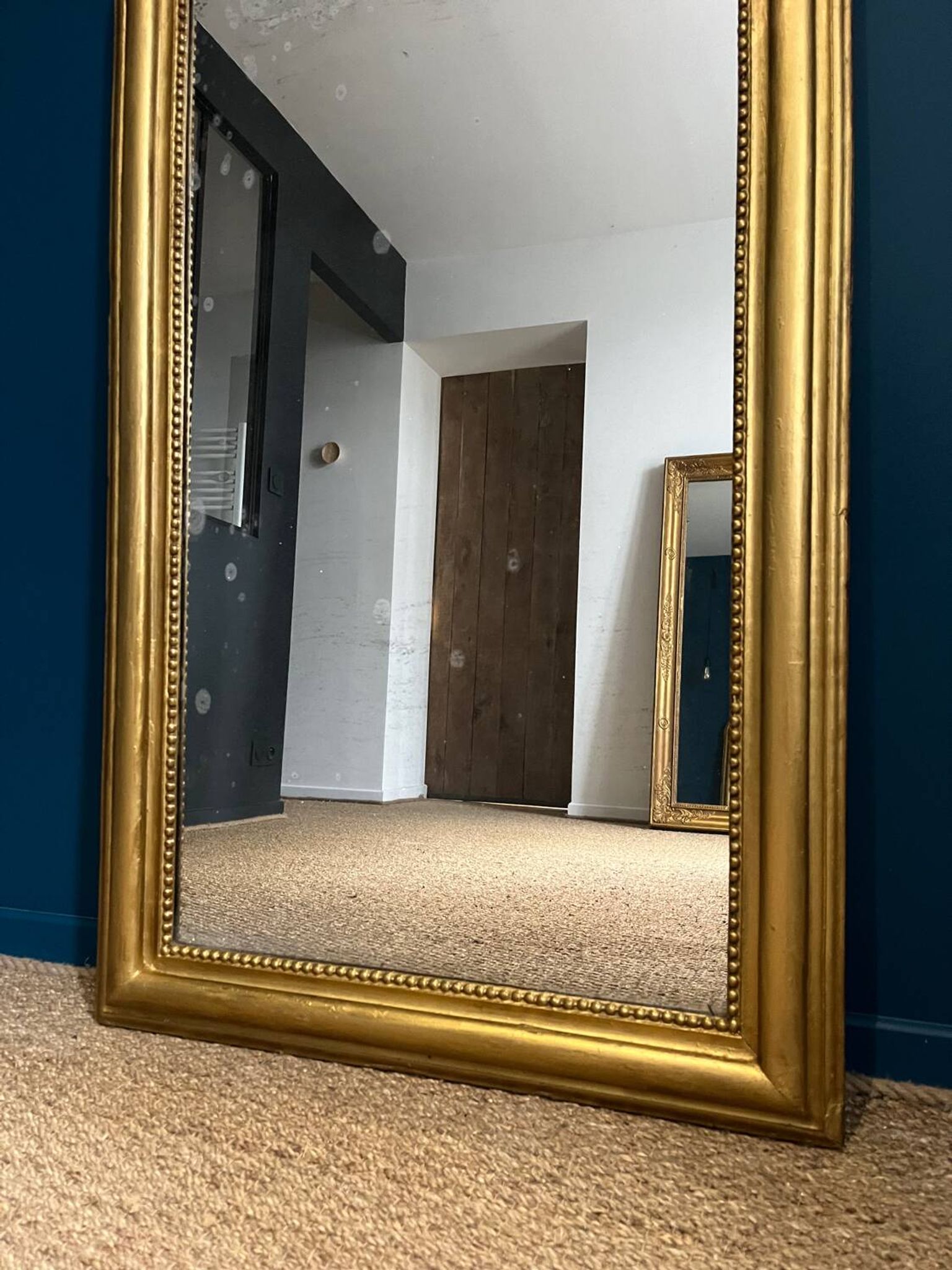 Miroir Louis-Philippe 126,5cm/75,5cm forme chapeau de gendarme, glace au mercure