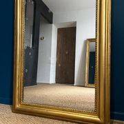 Miroir Louis-Philippe 126,5cm/75,5cm forme chapeau de gendarme, glace au mercure