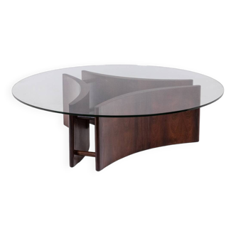 Rosewood coffee table, concave shape. 1970s.