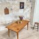 Vintage farmhouse table with spindle legs.