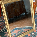 Old rectangular golden mirror baguette with beaded row
