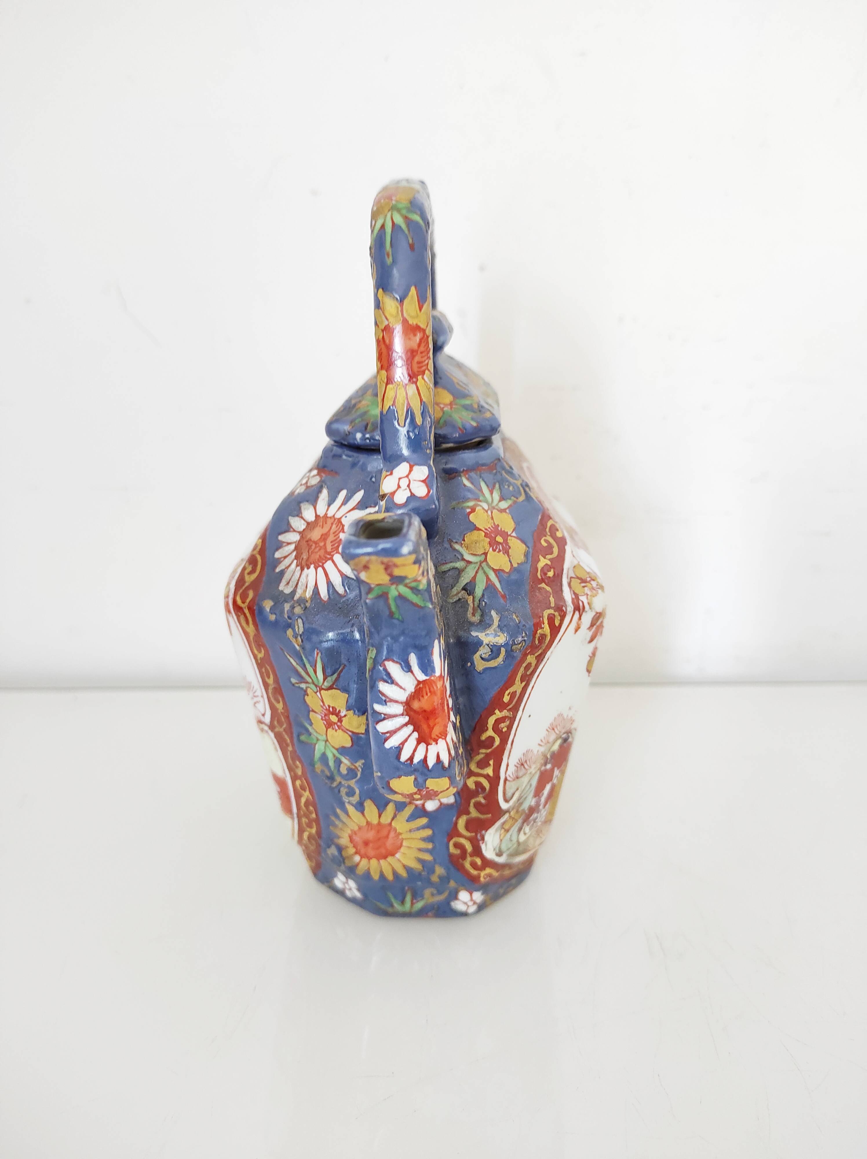 Japanese porcelain teapot with geisha decor