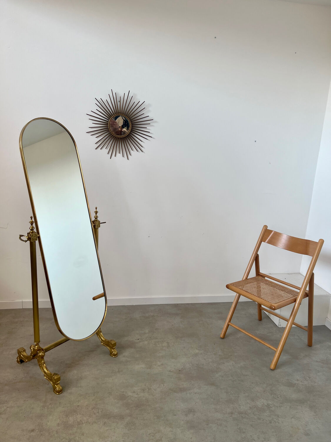 Old free-standing mirror in gilded brass in psychedelic neoclassical style Years 40 France