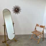 Old free-standing mirror in gilded brass in psychedelic neoclassical style Years 40 France