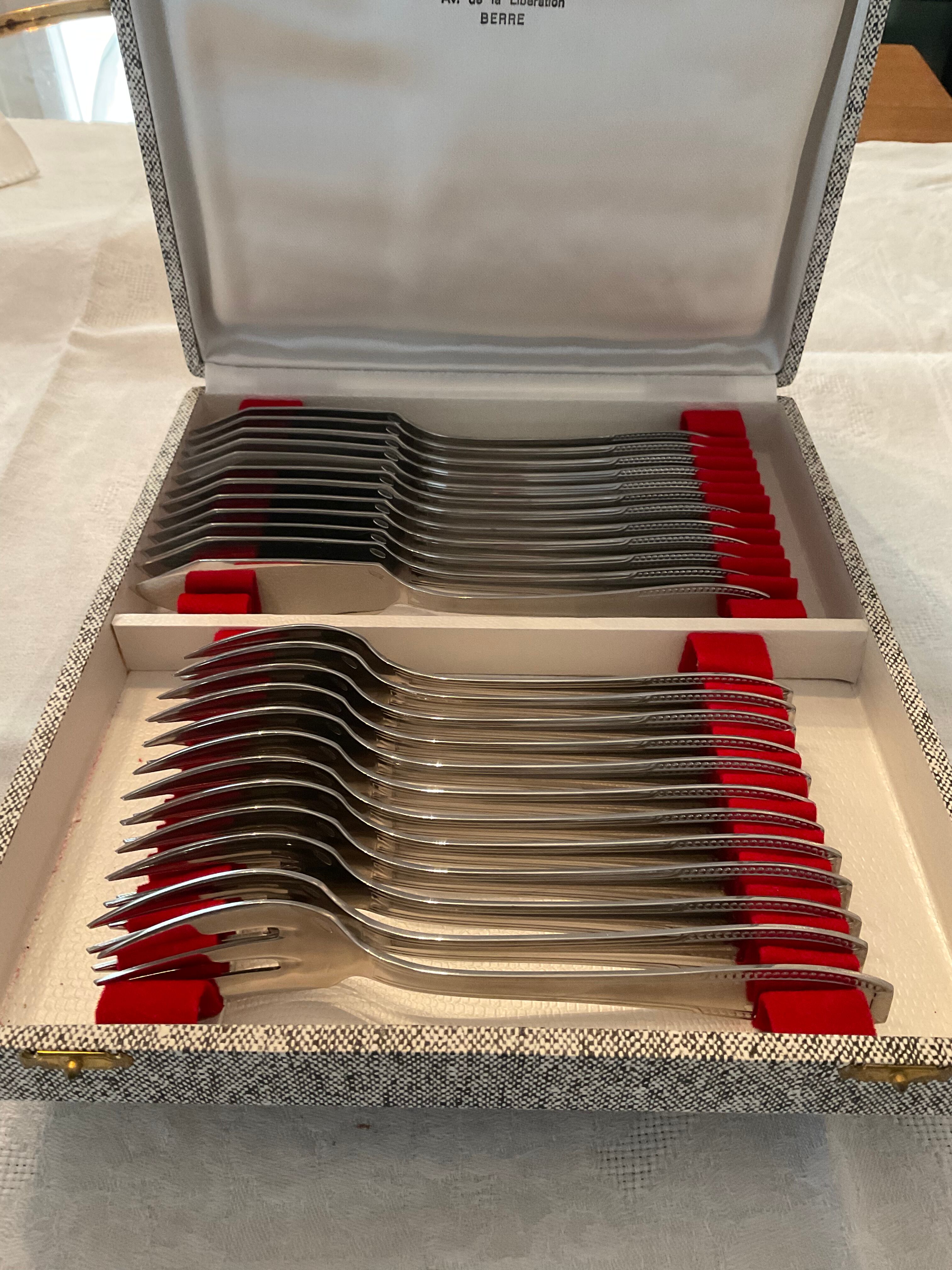 24 fish covers. Forks and knives . Stainless steel. Vintage