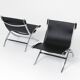 Un ensemble de chaises ciseaux - Paul Tuttle et Antonio Citterio