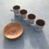 4 ceramic cups and saucers