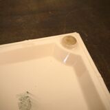 Digoin plate under pink earthenware