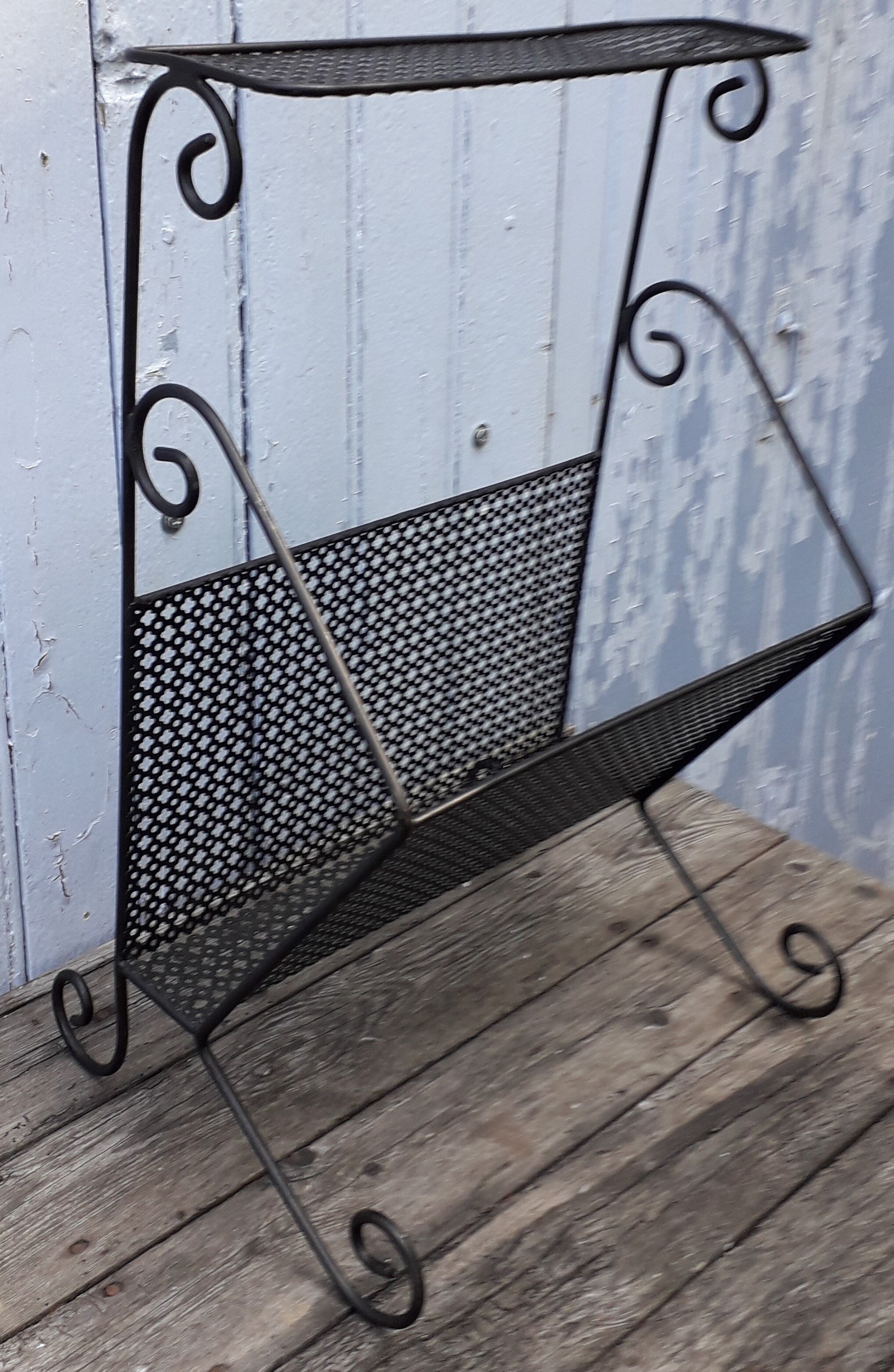 Metal magazine door