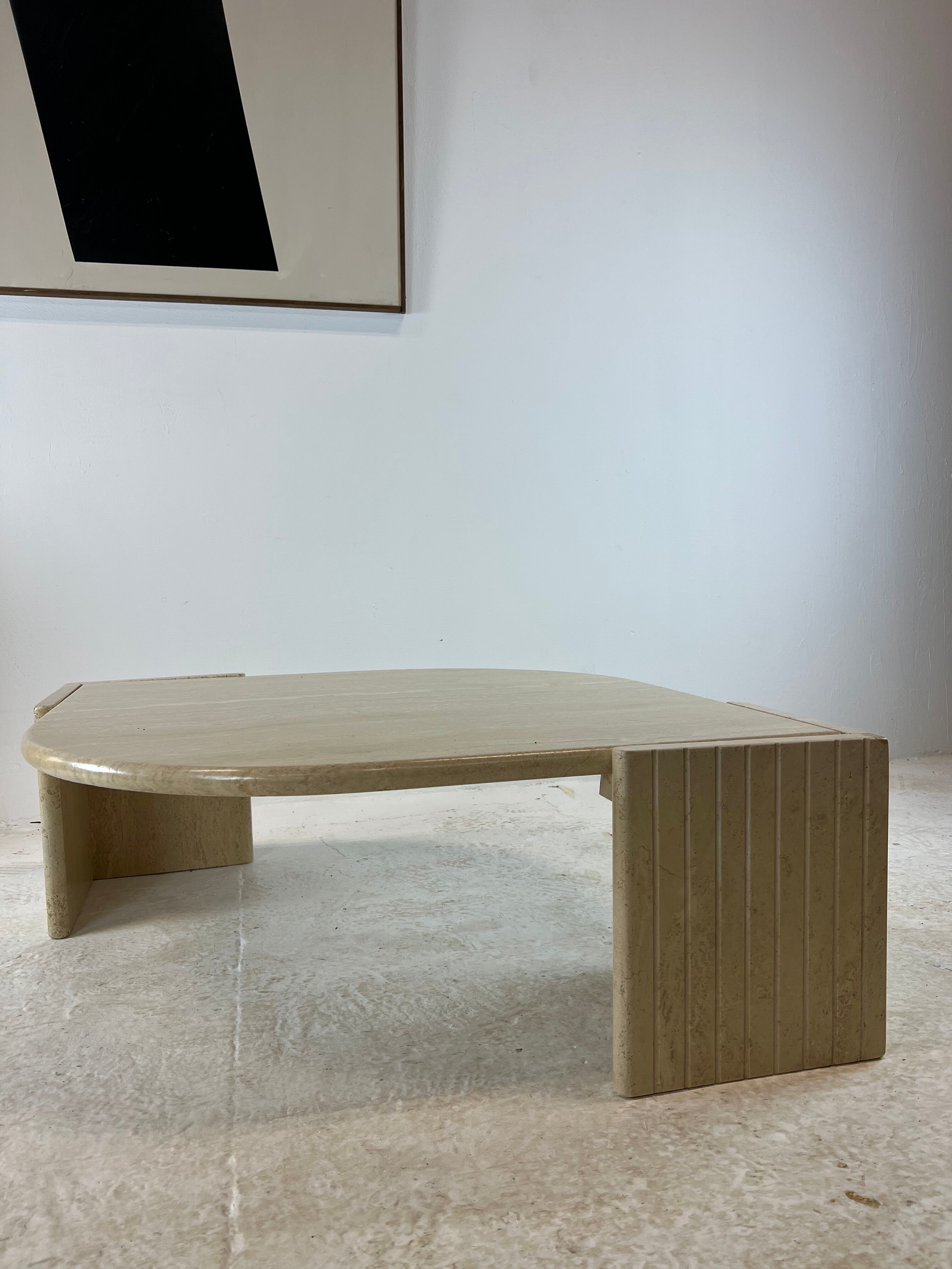 Coffee table Roche Bobois "eye" in travertine, 1970