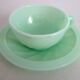 10 almond green opaline cups and saucers from the 50s