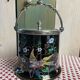 English porcelain and silver-plated metal cake tin