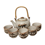 Asian set of a teapot and its cups