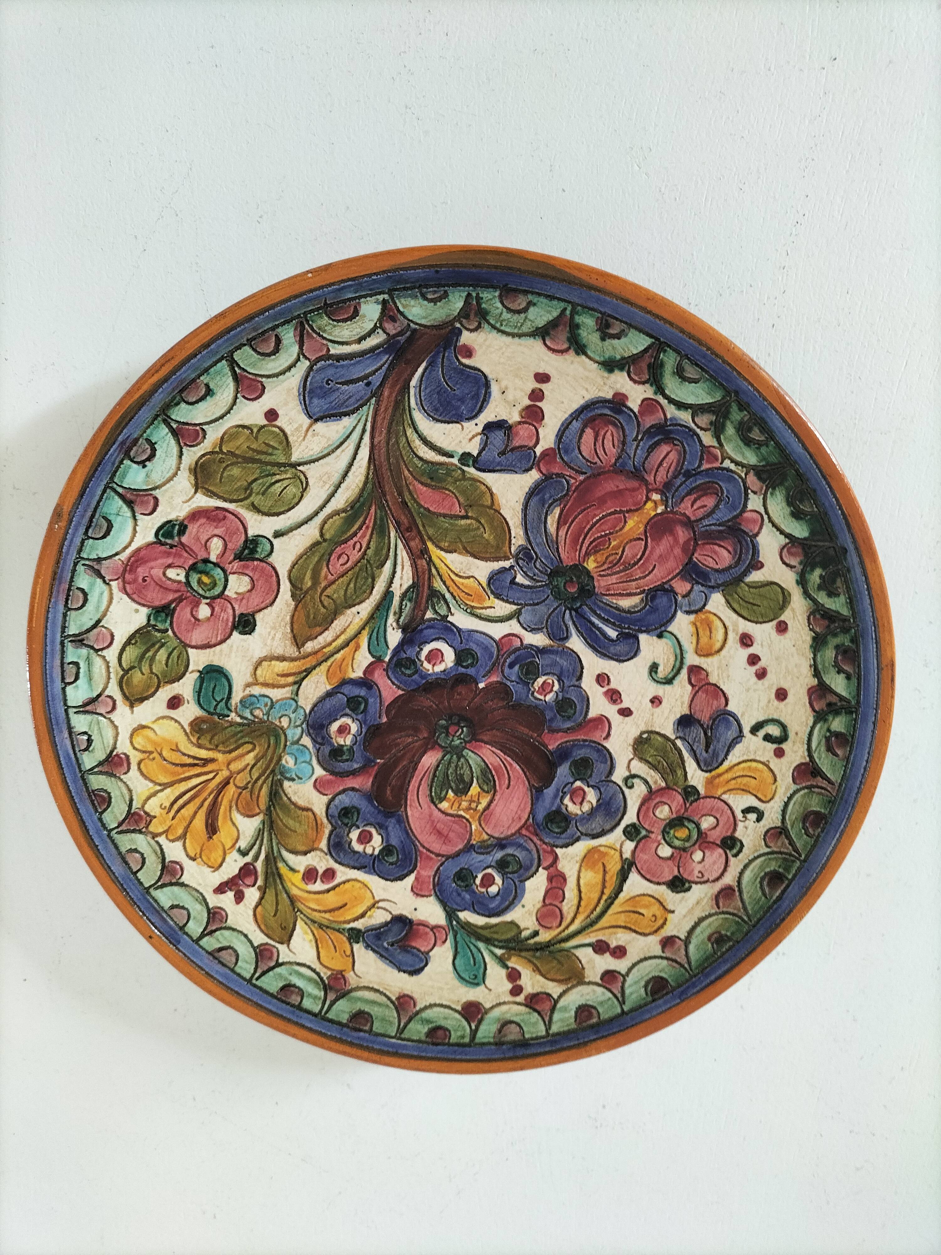 Spanish earthenware plate, hand-painted floral decoration.