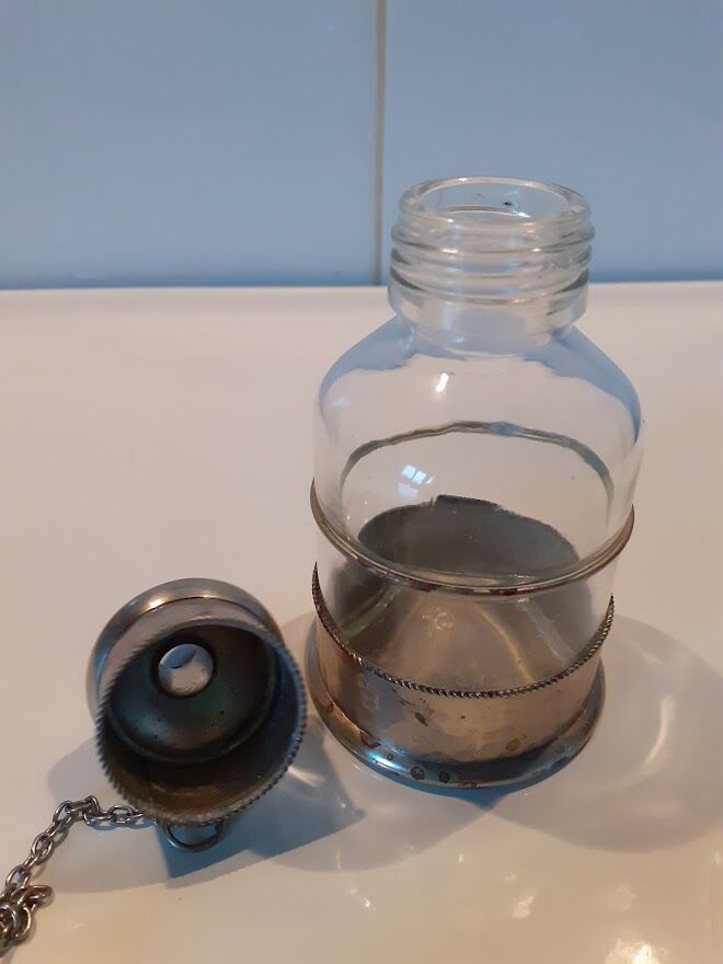 Glass and metal sugar sprinkler