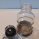 Glass and metal sugar sprinkler