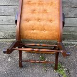 Chesterfield leather slipper chair with mahogany