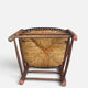 Antique rustic armchair in walnut and leather, 18th century.
