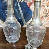 Pair of antique crystal and solid silver decanters.