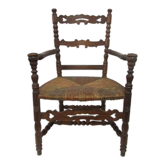Antique armchair with armrests