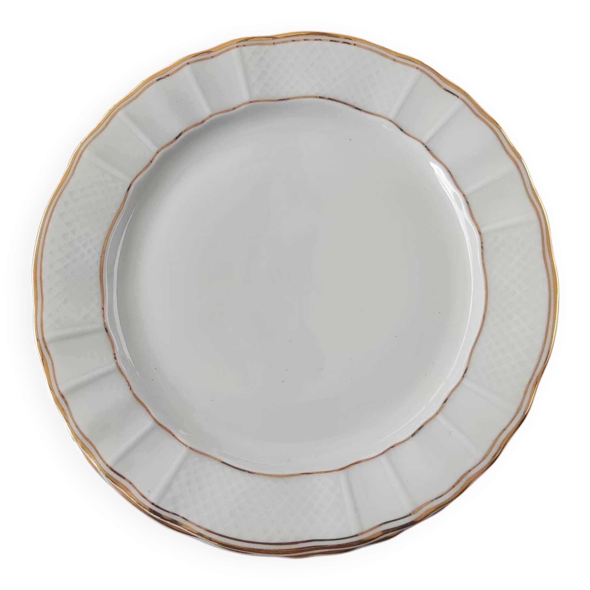 Dix assiettes en porcelaine de Limoges B et Cie