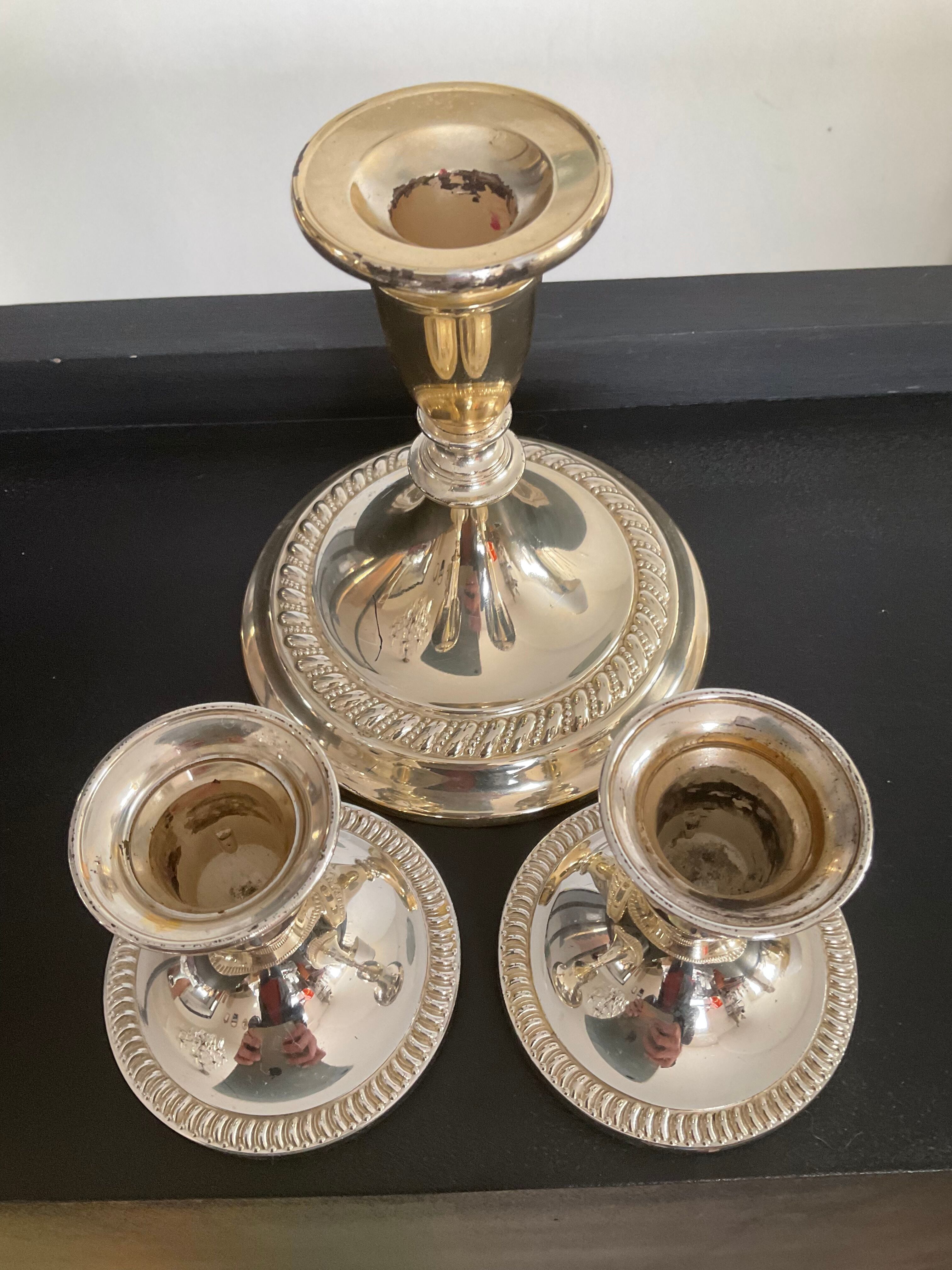 Series of 3 vintage candle holders in silver metal 70s