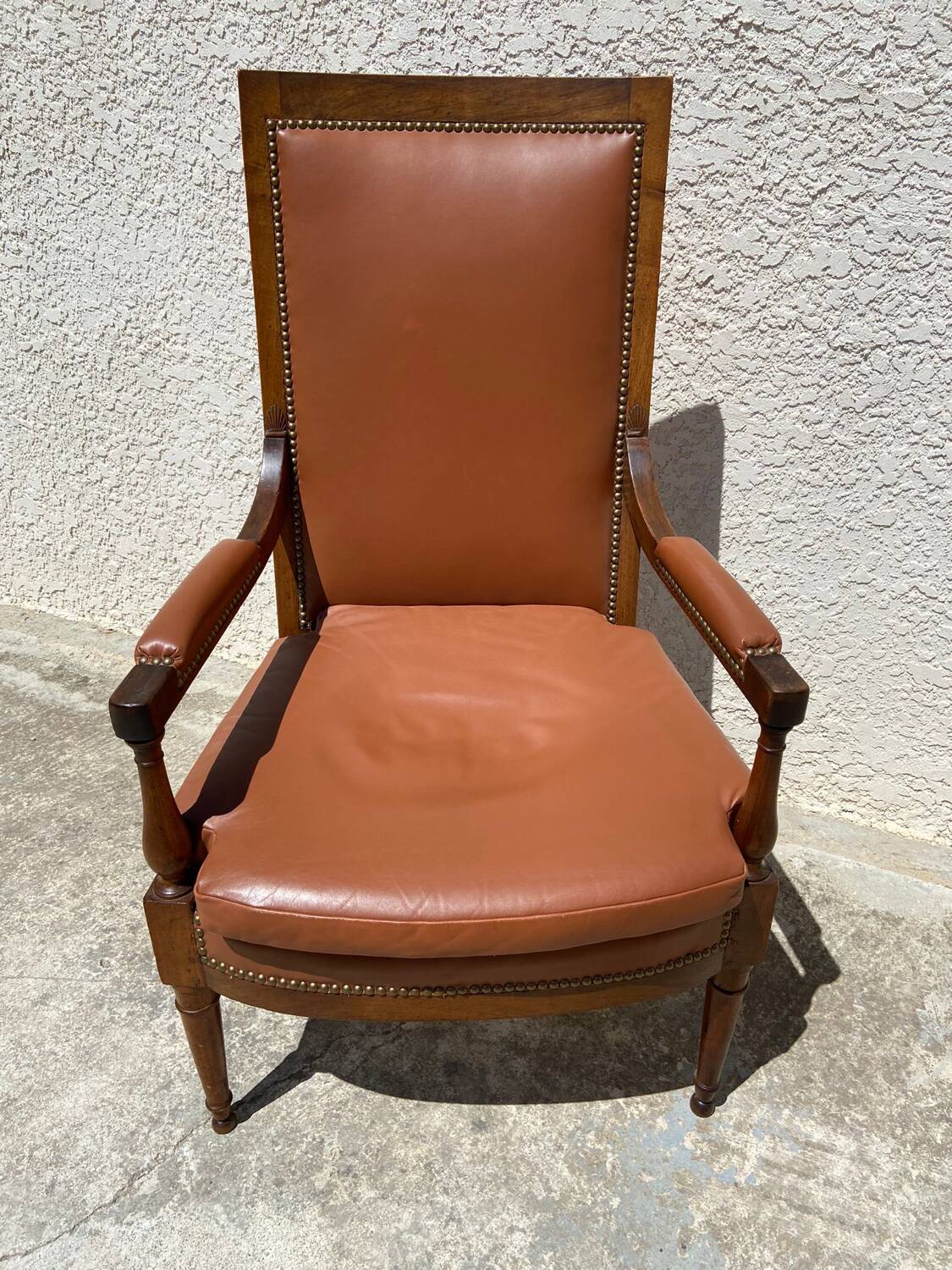 Wooden and leather armchair