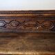 Antique carved solid wood bench from the early 20th century