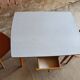 Together two Scandinavian chairs and its wooden and formica table