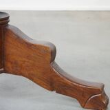 Wooden round 4-person dining table with detailed leg