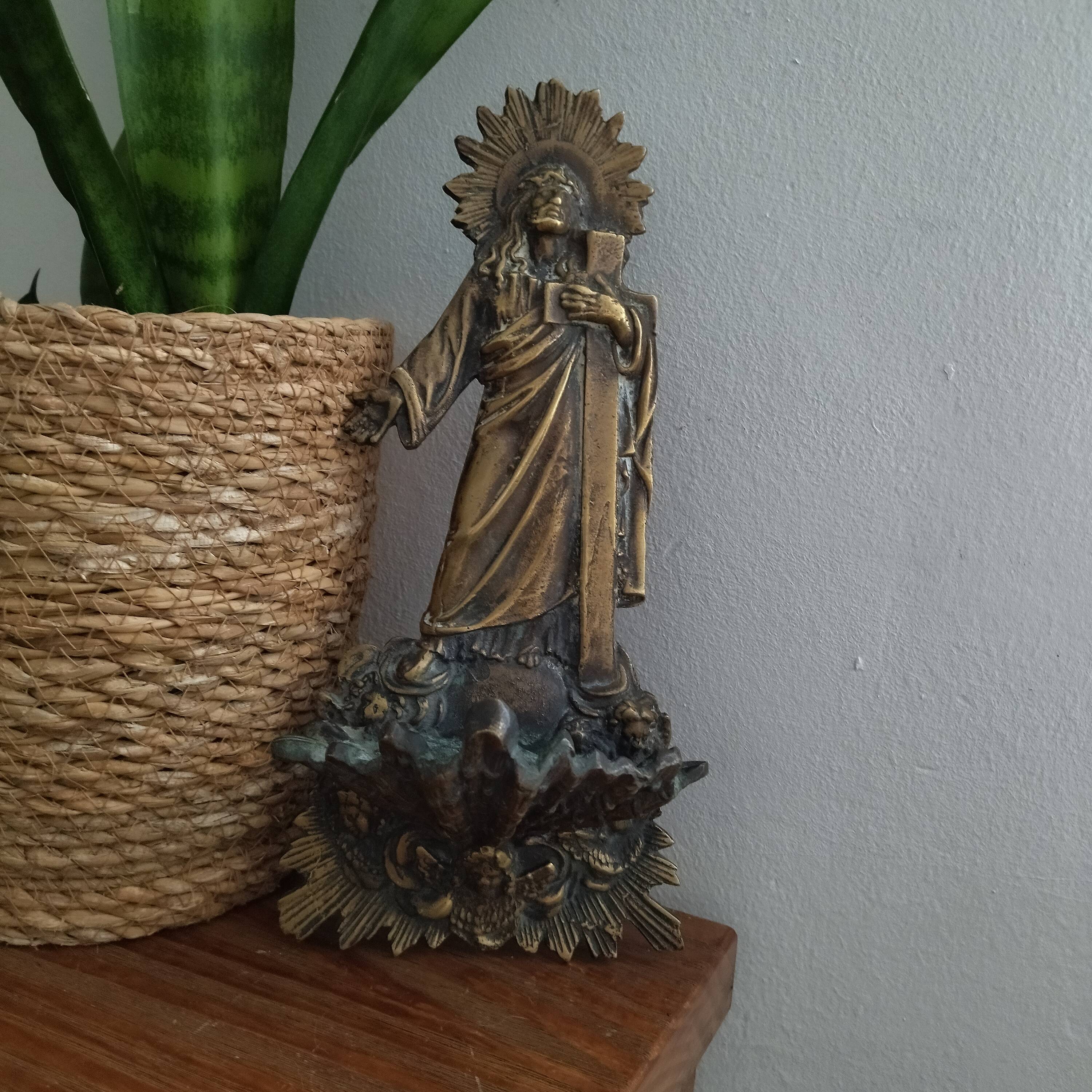 Antique bronze holy water font