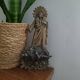 Antique bronze holy water font
