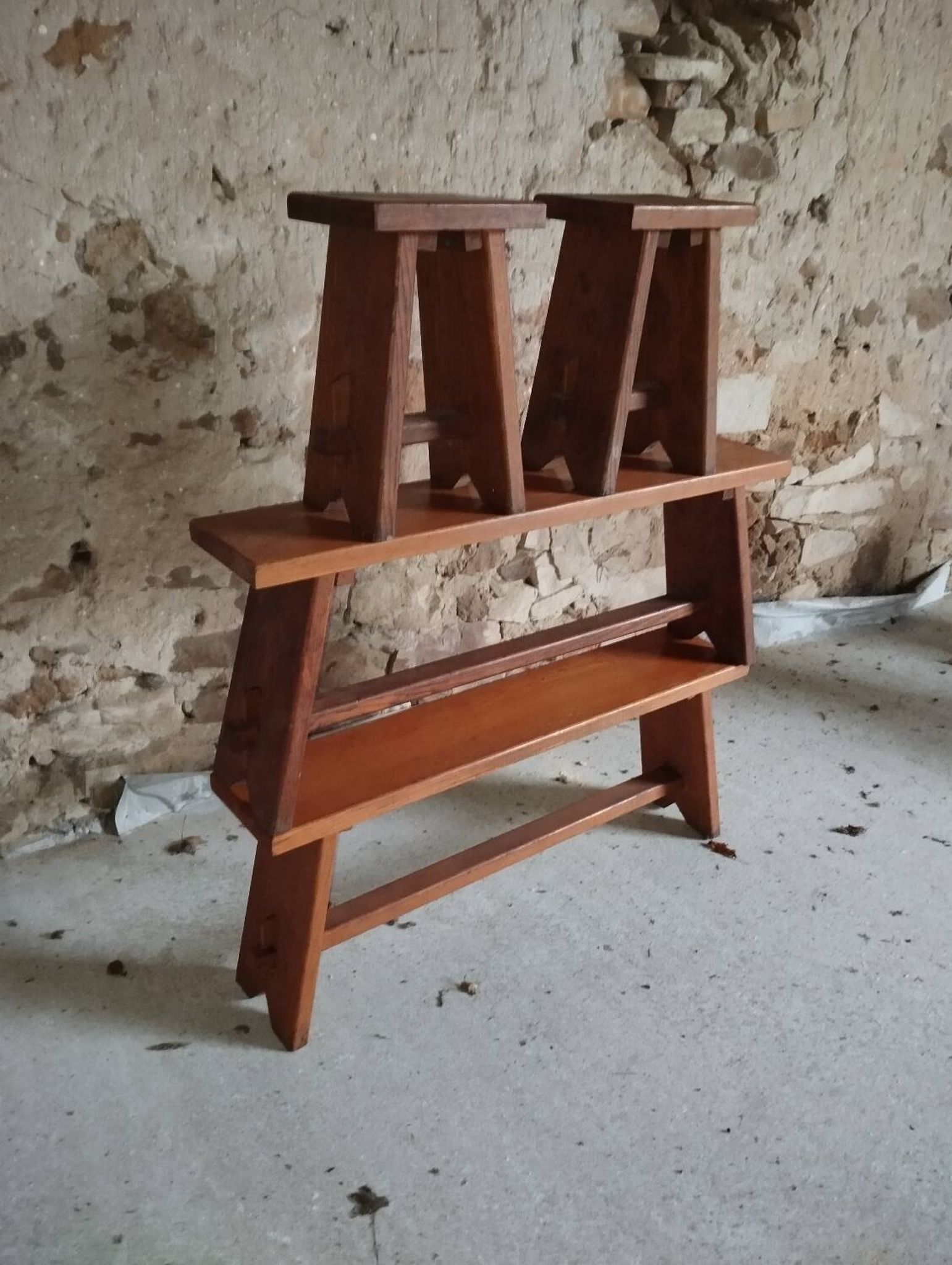 2 brutalist benches and 2 stools from the 1950s.