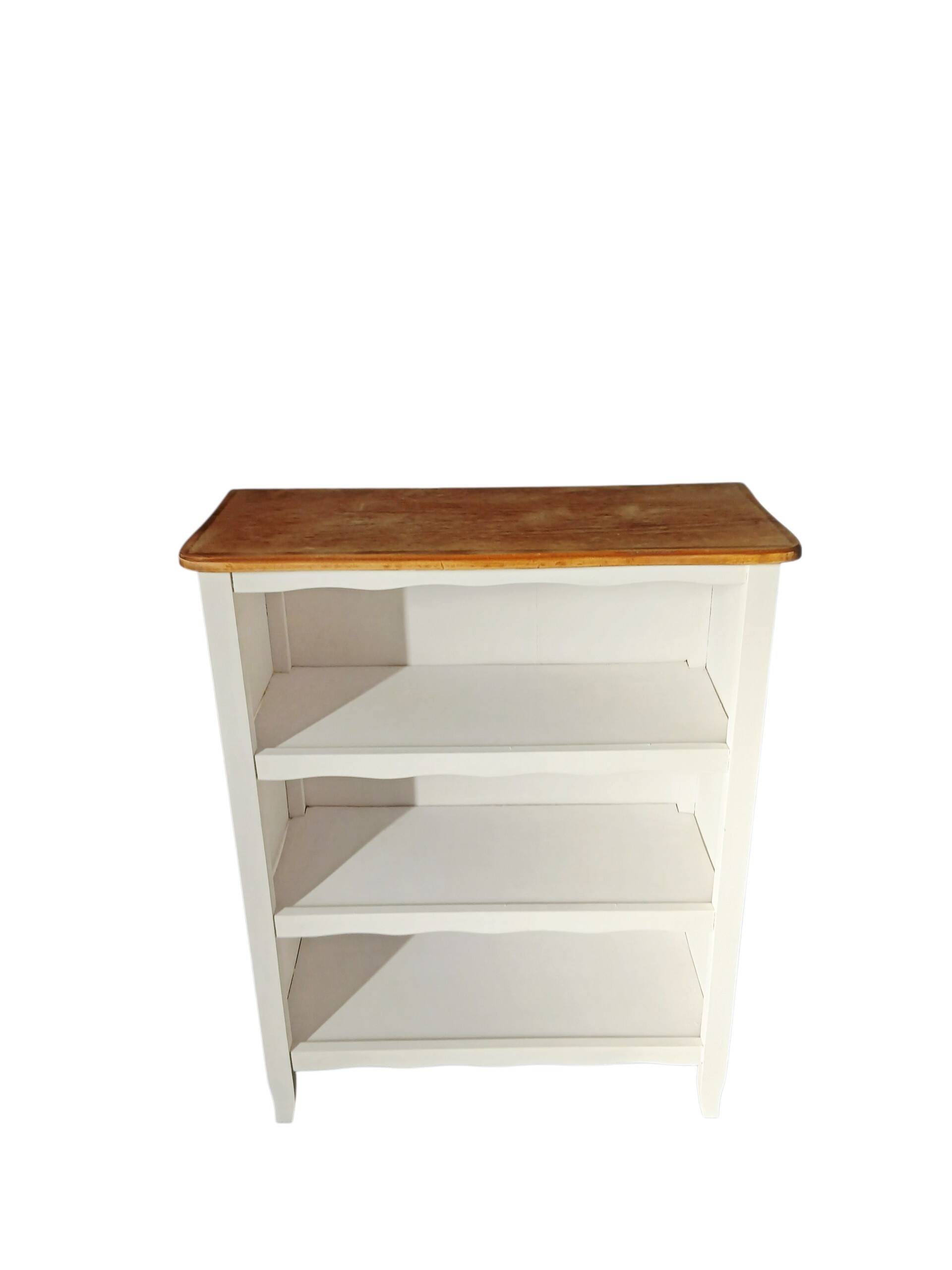 Old white bookshelf and raw wood.