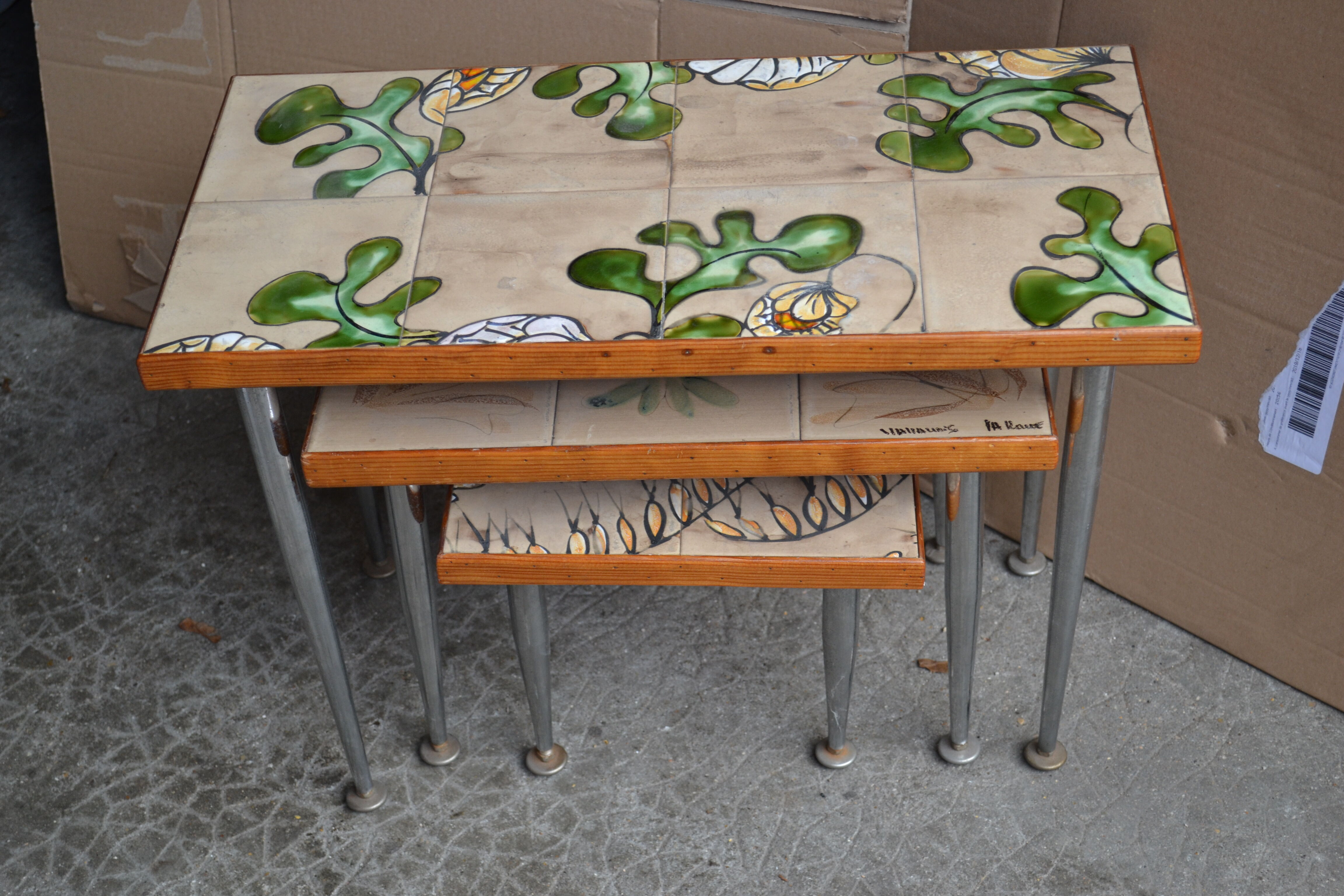 pull-out tables Vallauris, signed 'the wheel' ceramic, chrome foot