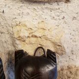 7 weekly African masks in carved wood