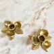 Pair of brass flower candle holders