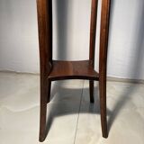 Vintage dark wood side table with curved base