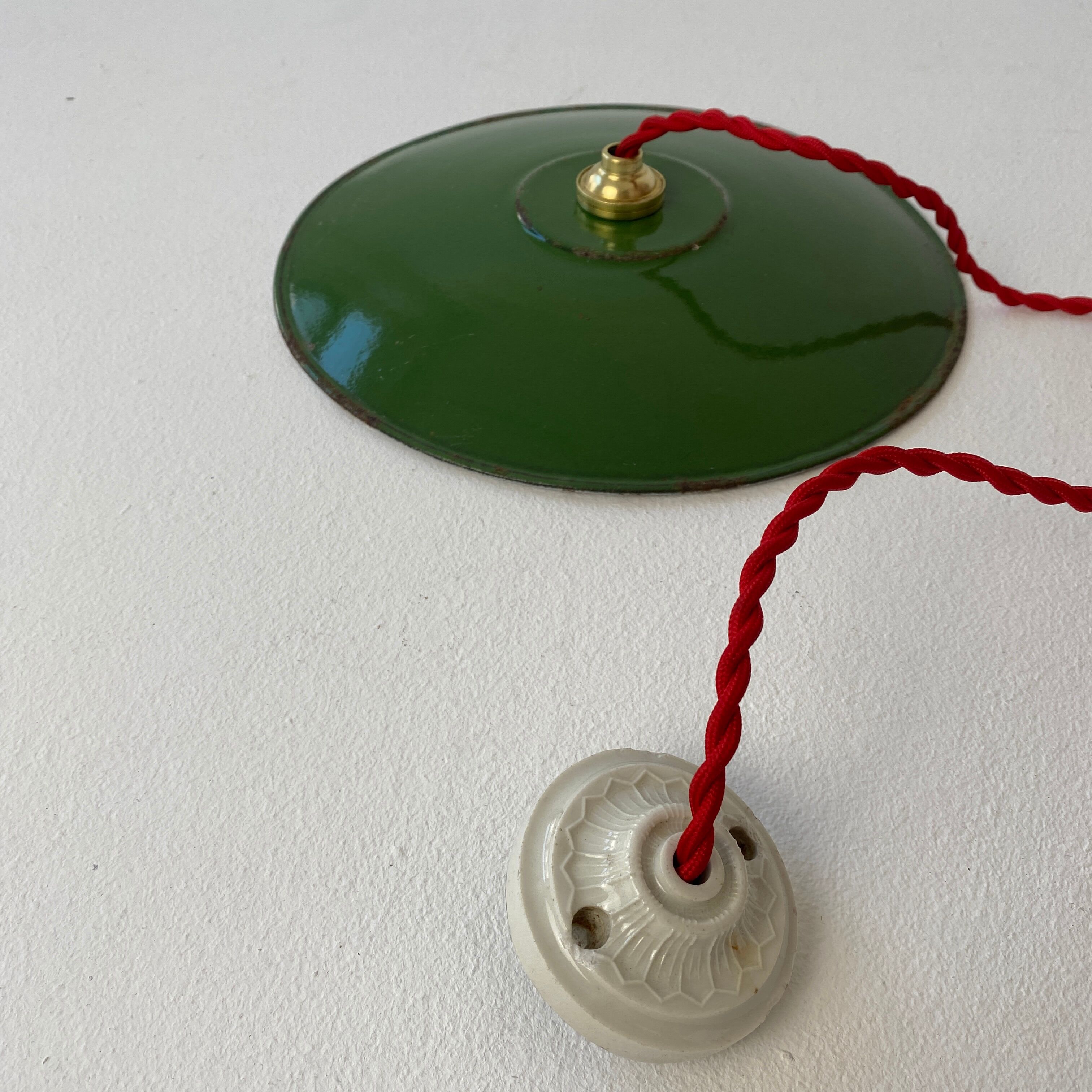 Pair of old green enamelled suspensions