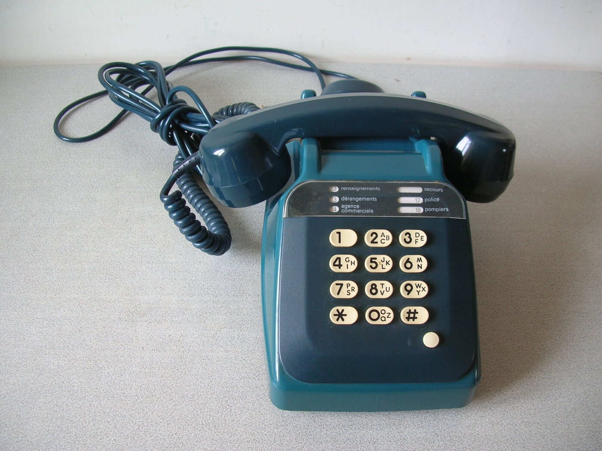 Old phone with keys Socotel S63 blue duck deco retro vintage office living room
