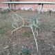 Garden furniture set with 1 table, 2 armchairs, and 2 chairs in antique green wrought iron.
