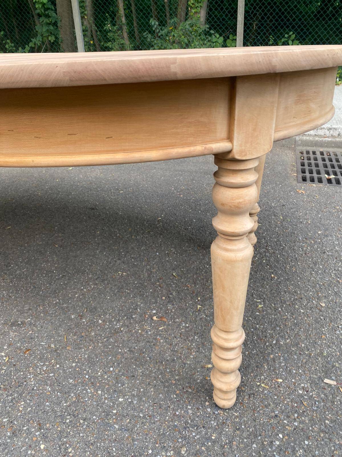 Round extendable dining table stripped in solid cherry wood France 1950